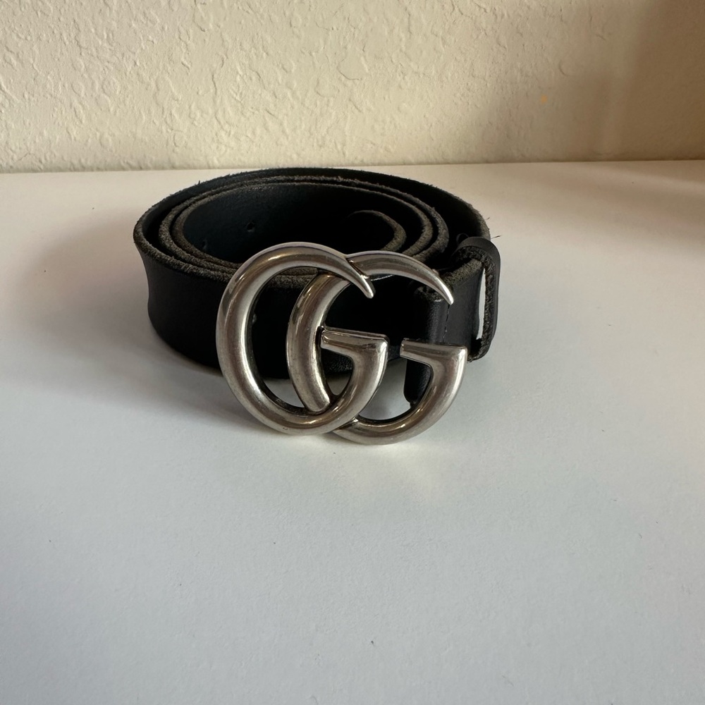 Black and silver Gucci belt